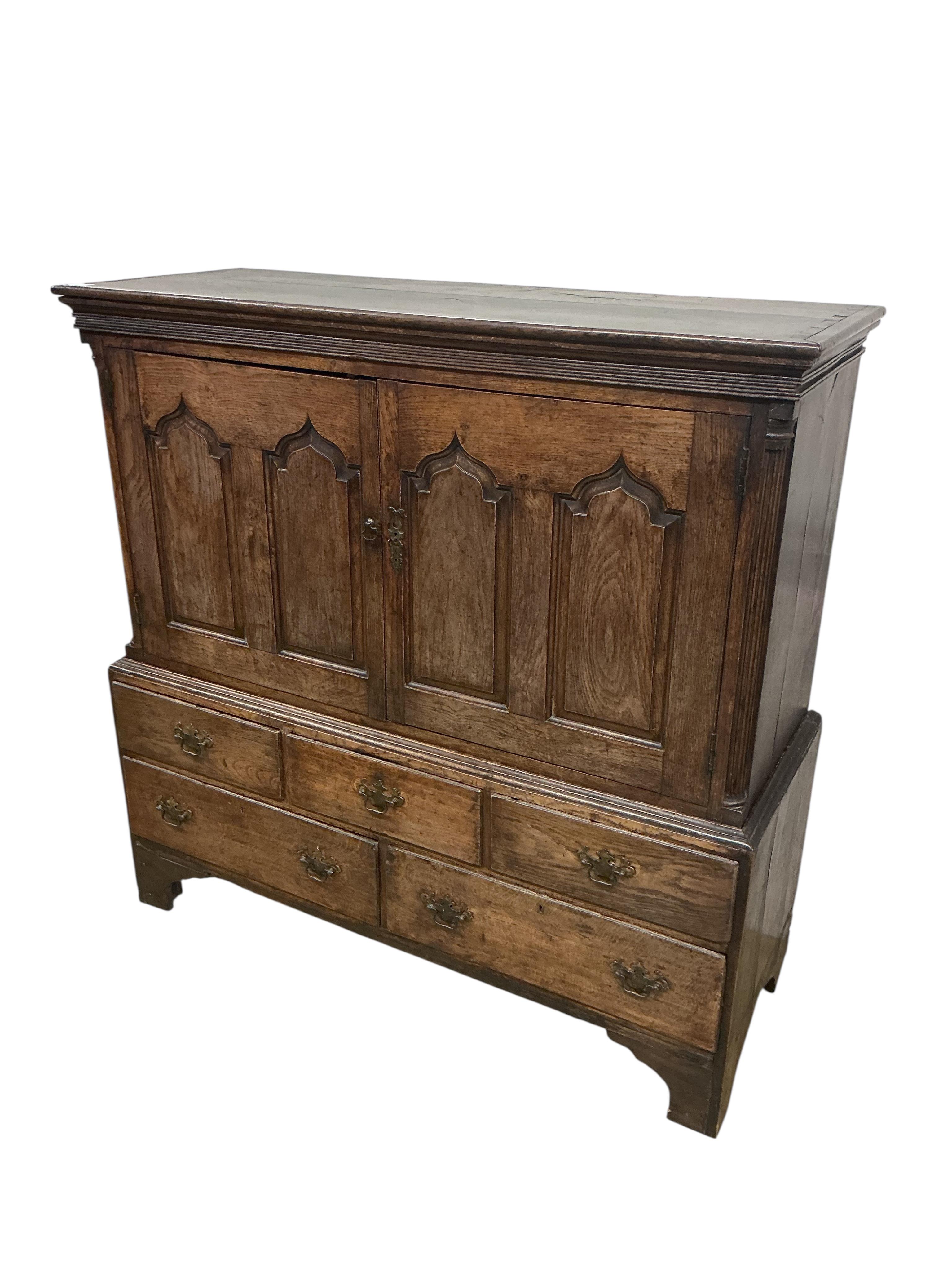 A late 18th century North Wales oak press cupboard, width 136cm, depth 51cm, height 136cm